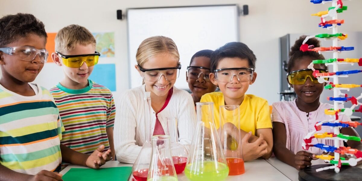 Pupils doing science in classroom